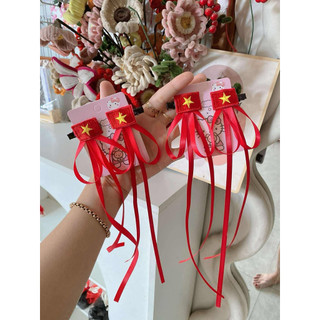 Set 2 kẹp nơ đỏ sao vàng cho bé phù hợp với các ngày lễ của đất nước