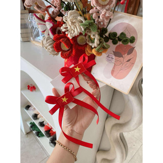Set 2 kẹp nơ đỏ sao vàng cho bé phù hợp với các ngày lễ của đất nước