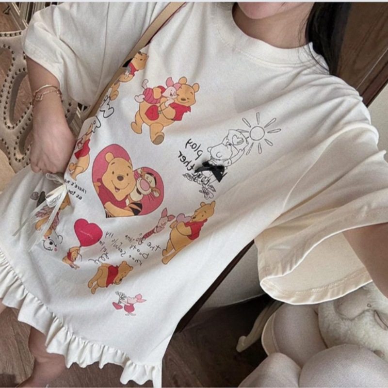 Váy thun dáng rộng tay lỡ, họa tiết gấu Pooh dễ thương, viền bèo lai phong cách trẻ trung xinh xắn HCOM26119