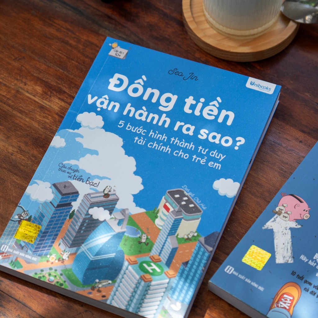 Sách - Đồng tiền vận hành ra sao - Unibooks