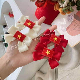 Set 2 kẹp nơ đỏ sao vàng cho bé phù hợp với các ngày lễ của đất nước