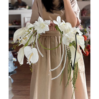 bó hoa cưới cầm tay cô dâu Nguyệt Hoà 1