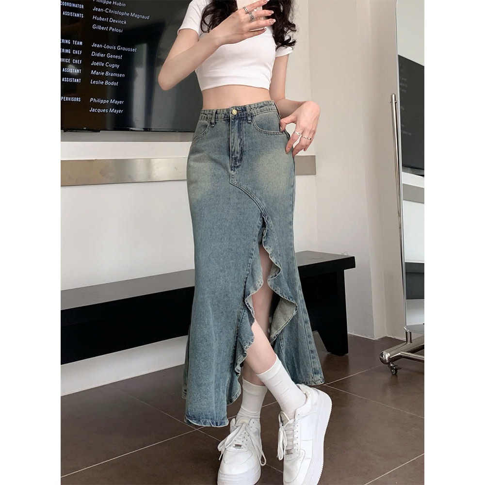 Chân váy jeans dáng dài xẻ tà lệch, viền bèo nữ tính phong cánh Hàn Quốc, co giãn, mặc được 4 mùa