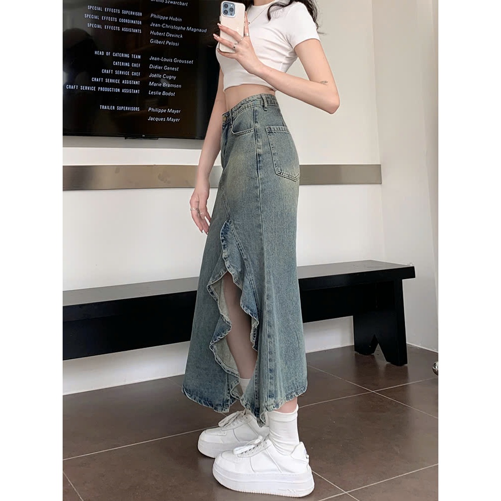 Chân váy jeans dáng dài xẻ tà lệch, viền bèo nữ tính phong cánh Hàn Quốc, co giãn, mặc được 4 mùa