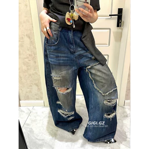 Quần jeans suông loang rách vá