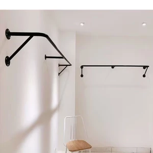 Giá treo quần áo gắn tường cửa hàng quần áo giá trưng bày quần áo gắn bên hông quần áo trẻ em trai và gái bằng sắt sơn