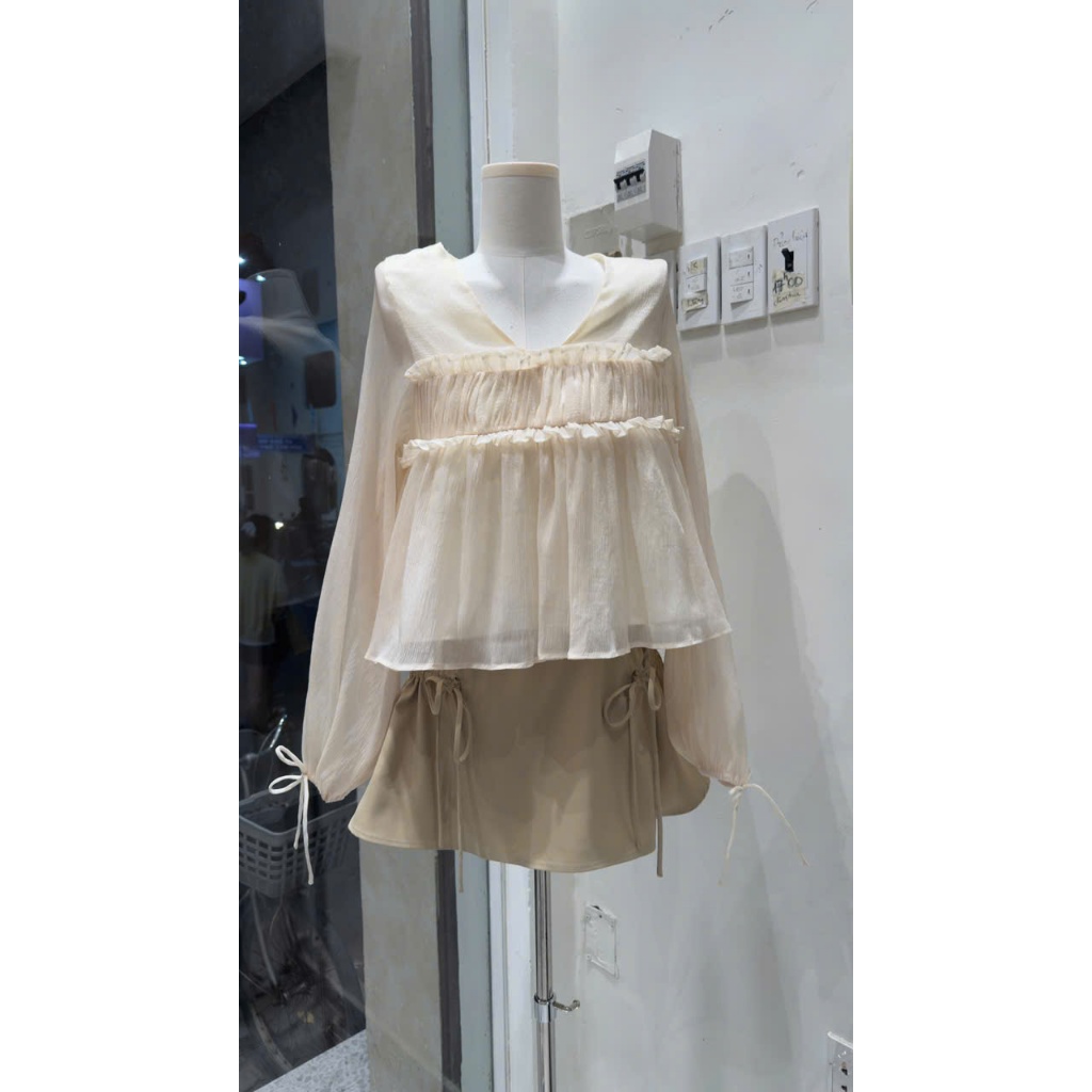Chân Váy Nữ UNCOS SKIRT Form A Xòe Phối Túi Dây Rút Dễ Thương SECODEE