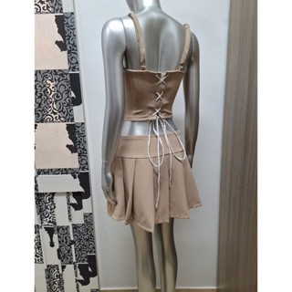 Set áo croptop dây và váy quần giả váy xếp ly vnxk dư IRIS size S(N80-85,E74-79)
