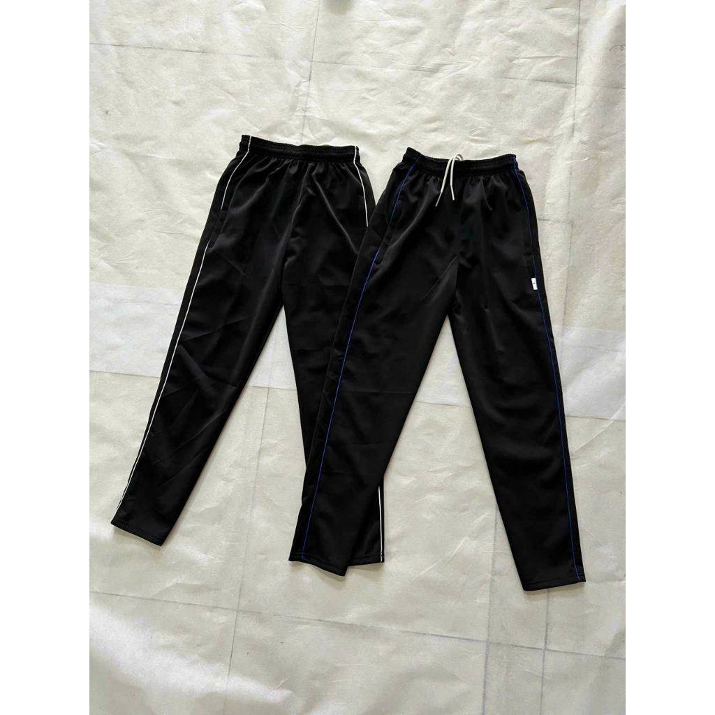 Quần thể dục thể thao nam nữ thun poly co giãn tốt, mẫu màu đen 1 viền ( màu viền ngẫu nhiên -nts).