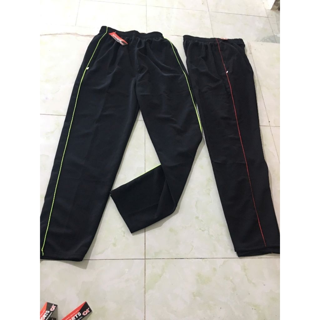 Quần thể dục thể thao nam nữ thun poly co giãn tốt, mẫu màu đen 1 viền ( màu viền ngẫu nhiên -nts).