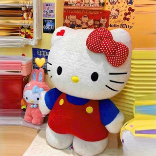 (Căng Phồng) Gấu Bông Hello Kitty Đứng Yếm Đỏ Đeo Nơ Chấm Bi Đáng Yêu, Chất Liệu Lông Thỏ Mịn, Căng Phồng