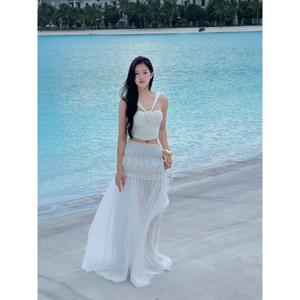 Set Đi Biển Áo Cổ Yếm Croptop Đính Hoa Kèm Chân Váy Voan Maxi Dáng Dài Màu Trắng SAN Clothings - P184