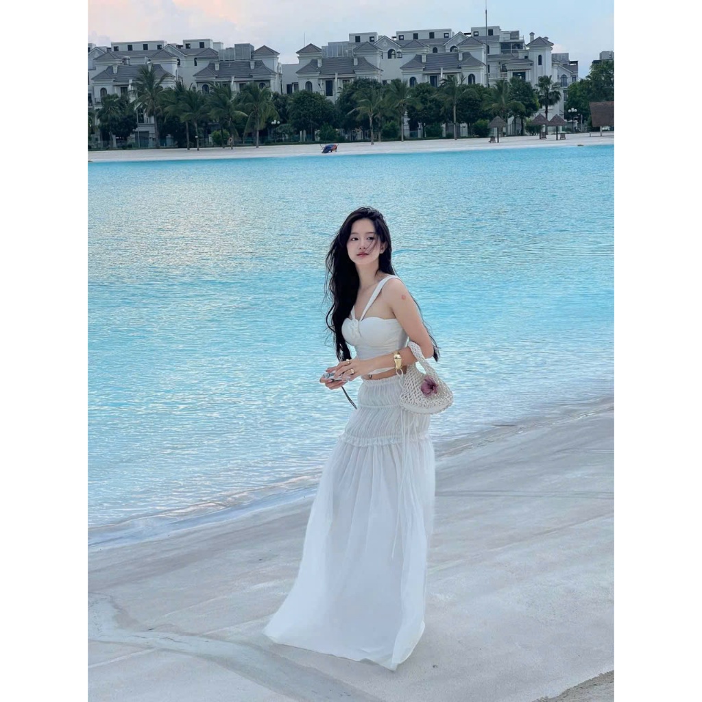 Set Đi Biển Áo Cổ Yếm Croptop Đính Hoa Kèm Chân Váy Voan Maxi Dáng Dài Màu Trắng SAN Clothings - P184