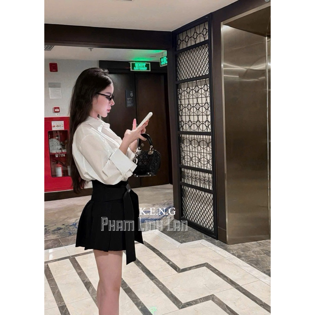 Set áo sơmi trắng chân váy xếp ly buộc nơ xinh