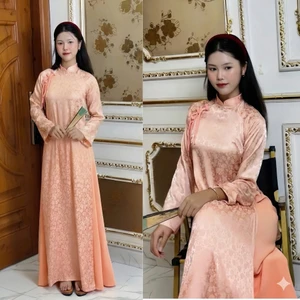 Áo Dài Cách Tân Nữ Gấm Vân Chìm Màu Hồng Cam Đào Sang TrọngSet Áo Dài Nữ Tay Dài Cổ Trụ Thấp Cách Điệu Phối Nơ T1565G