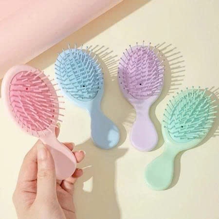 Lược chải tóc mini cầm tay nhiều màu có đệm khí gỡ rối massage da dầu