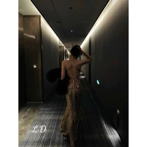 Đầm kim sa đuôi cá đan dây hở lưng