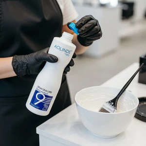 KEM OXY 9% TRỢ NHUỘM TẨY AOLINDE PHA MÀU THỜI TRANG KHÔNG RÁT DA ĐẦU THƠM 1000ML