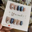 484. nailbox mắt mèo màu da, màu xanh đen bling bling