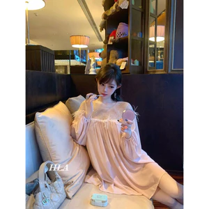 Áo voan phối lưới đính đá lông vũ