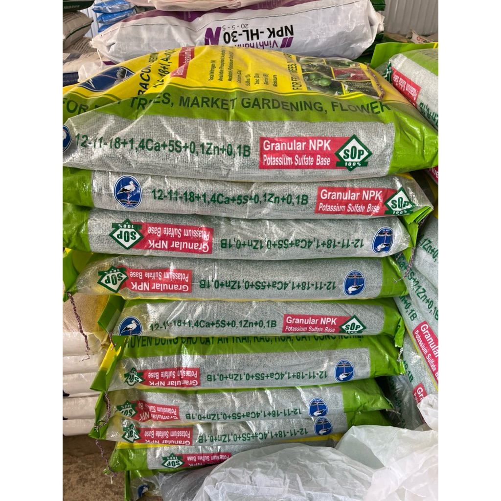 1 Bao 12-11-18 Ba con co Bao 25kg- chuyên cho cây ăn trái