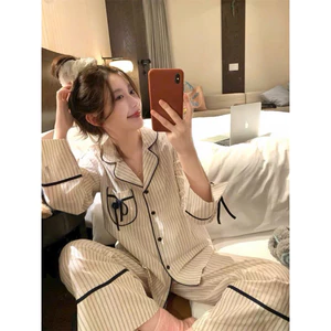 Bộ pyjama kẻ nơ túi