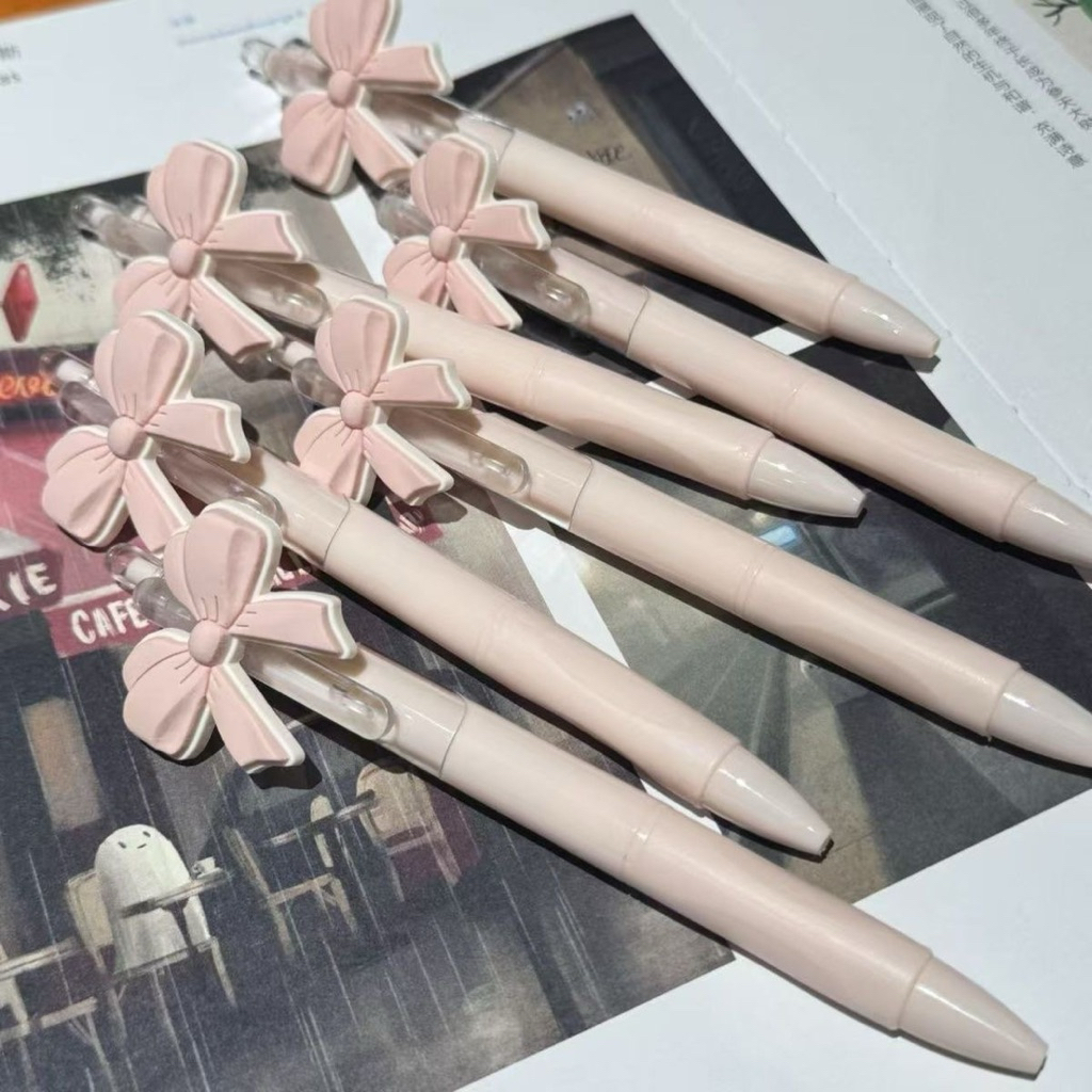 (1  bút 4 ruột) Bút Bi Nơ Hồng Dễ Thương – Bút Mực Đen 0.5mm Dạng Nhấn, Bút Viết Học Sinh Phong Cách Hàn Quốc