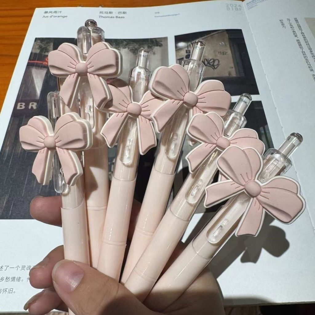 (1  bút 4 ruột) Bút Bi Nơ Hồng Dễ Thương – Bút Mực Đen 0.5mm Dạng Nhấn, Bút Viết Học Sinh Phong Cách Hàn Quốc