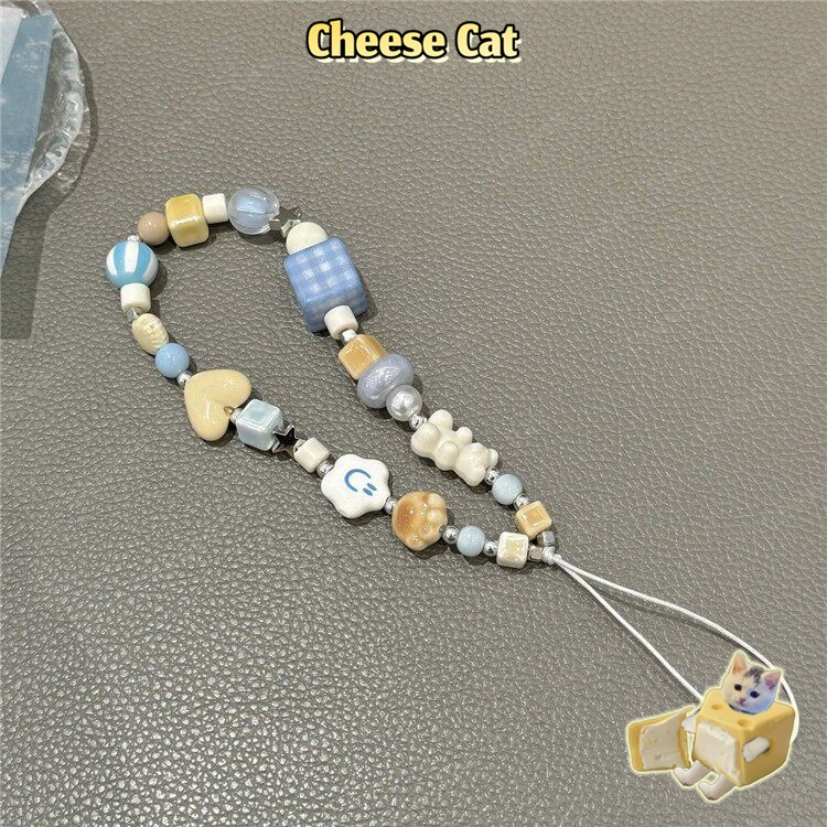 Dây chuyền điện thoại di động hình móng vuốt mèo kem siêu dễ thương Đồ trang trí điện thoại di động chống thất lạc