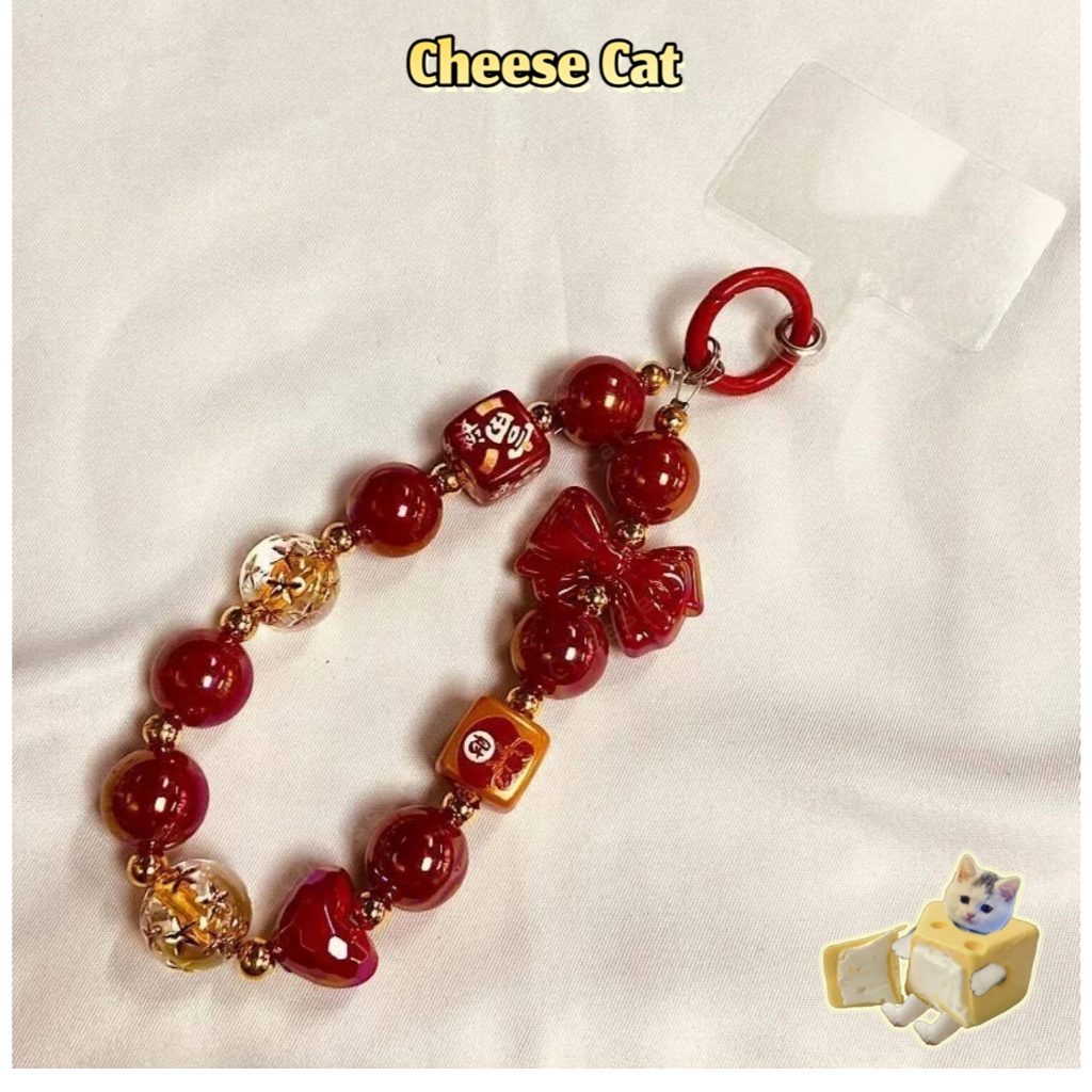 Vỏ điện thoại vòng tay đính cườm phong cách năm mới mặt dây chuyền túi đựng chìa khóa ccd mặt dây chuyền chống thất lạc