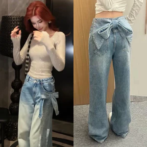 Quần jeans suông đính đá kèm nơ