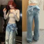 Quần jeans suông đính đá kèm nơ