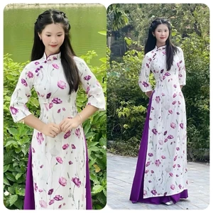 Áo dài hoa nhí dáng cô cổ lệch đính khuy xinh trắng phối tím cách tân chất lụa gấm Thanh Yên T1571G