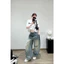 Quần jeans suông rách lót đen 1 bên