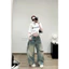 Quần jeans suông rách lót đen 1 bên