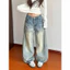 Quần jeans suông sọc sau