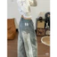 Quần jeans suông sọc sau