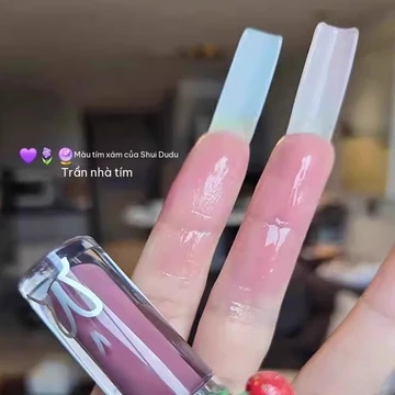 Cây son môi bóng tím thiên niên này quá rực rỡ! HYNTOOR Hắc Thỏ son môi bóng nước nude có nhũ lấp lánh, bền màu số 103