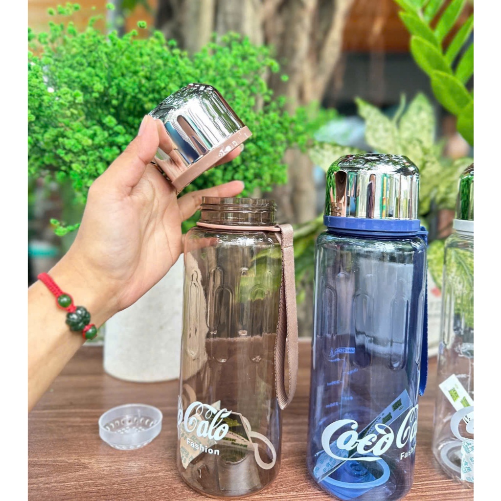 BÌNH NƯỚC TRONG SUỐT COCO DÁNG THỂ THAO 900ML