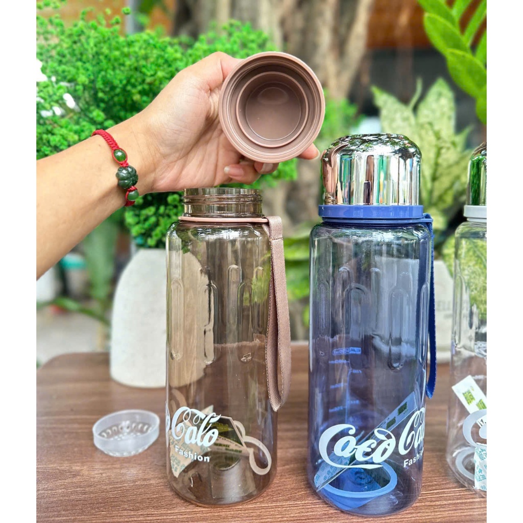 BÌNH NƯỚC TRONG SUỐT COCO DÁNG THỂ THAO 900ML