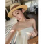 Đầm quây bí phồng thắt nơ hông