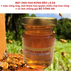 Mật Ong Hoa Rừng Đèo La Dạ hũ thuỷ tinh 100gram, màu vàng óng, mùi vị thơm hoà quyện của nhiều loại hoa rừng.