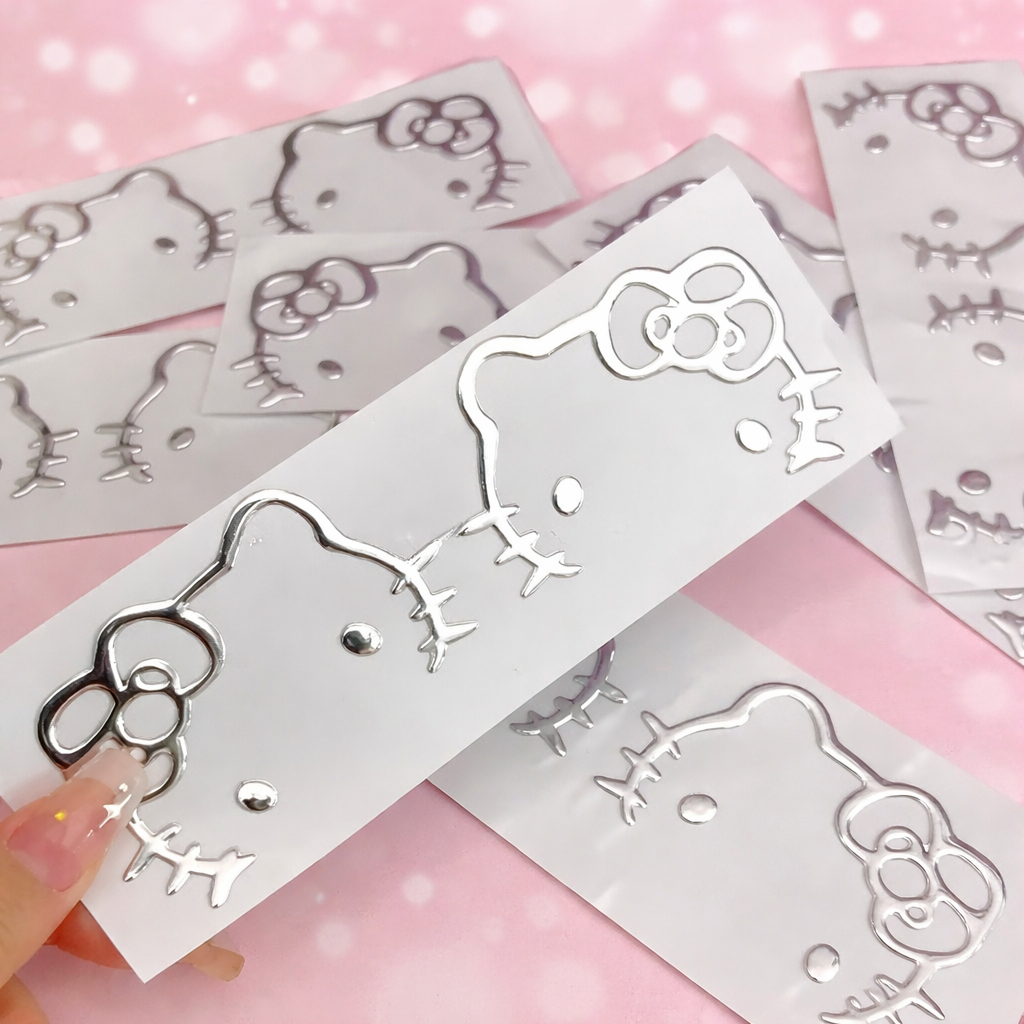 Nhãn dán Hello Kitty 3D Cao cấp Mạ Nhũ Bạc cho máy tính, tai nghe, xe điện, ô tô kích thước 9x7cm