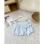 Chân váy bí nơ chất thô