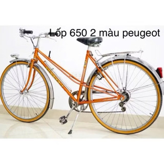 Lốp 650 2 màu đen +vàng  nắp xe peugeot sao vàng
