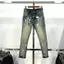 Quần Jeans nam xanh pơ pồ vàng kẻ ngang bốn cúc tang lụa