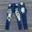 quần Jeans nam đen bạc vảy sơn đá bốn cúc có tang hồng