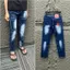quần bò nam xanh lá đổ thêu sau mông bốn cúc