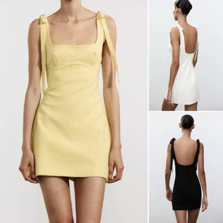 Đầm body dáng ngắn hai dây nơ(Sẵn caro hồng M,L)