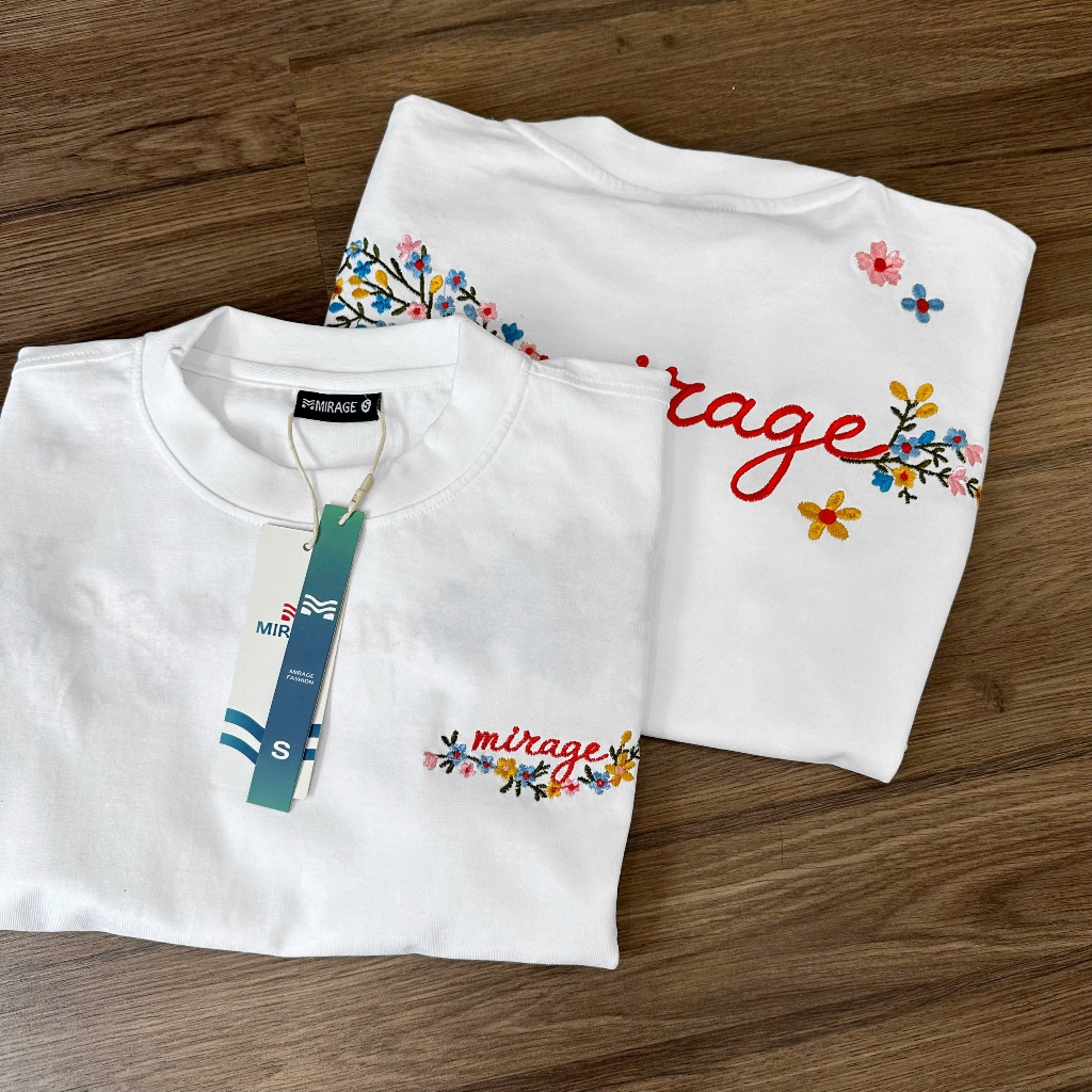 Áo Thun Mirage Thêu Chữ Hoa Màu Trắng Nghệ Thuật, Chất 100% Cotton Mềm Mịn Thoáng Mát.
